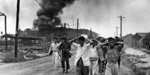 U.S. troops bring in North Korean prisoners of war, Oct. 7, 1950.