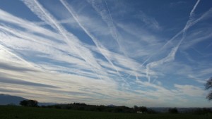 an-image-of-chemtrails-left-in-the-air-by-aeroplanes-814778691