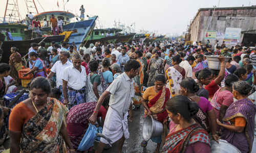 A fish market at Nagor harbour in Nagapattinam, Tamil Nadu, India. The bay can provide only a meagre living: 61% of fisherfolk live below the poverty line. Photograph: Dhiraj Singh/Bloomberg/Getty Images