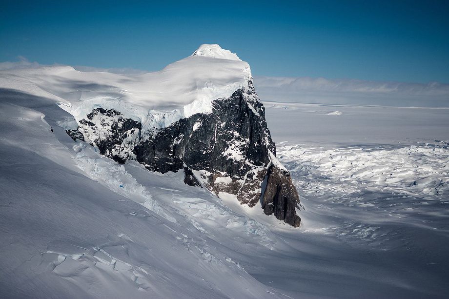 A rock outcropping on Fleming Glacier, which feeds one of the accelerating glaciers in Marguerite Bay on the western Antarctic Peninsula. Photo: NASA/OIB